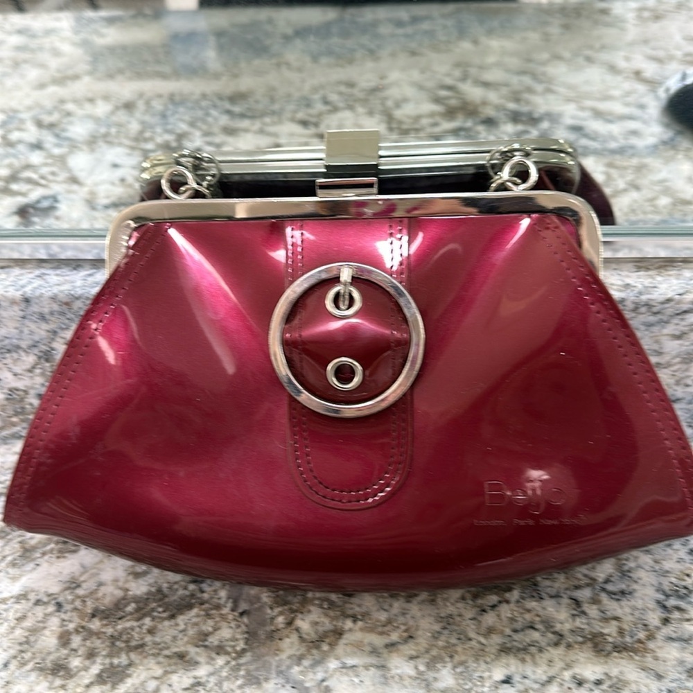 Beijing patented leather small clutch.